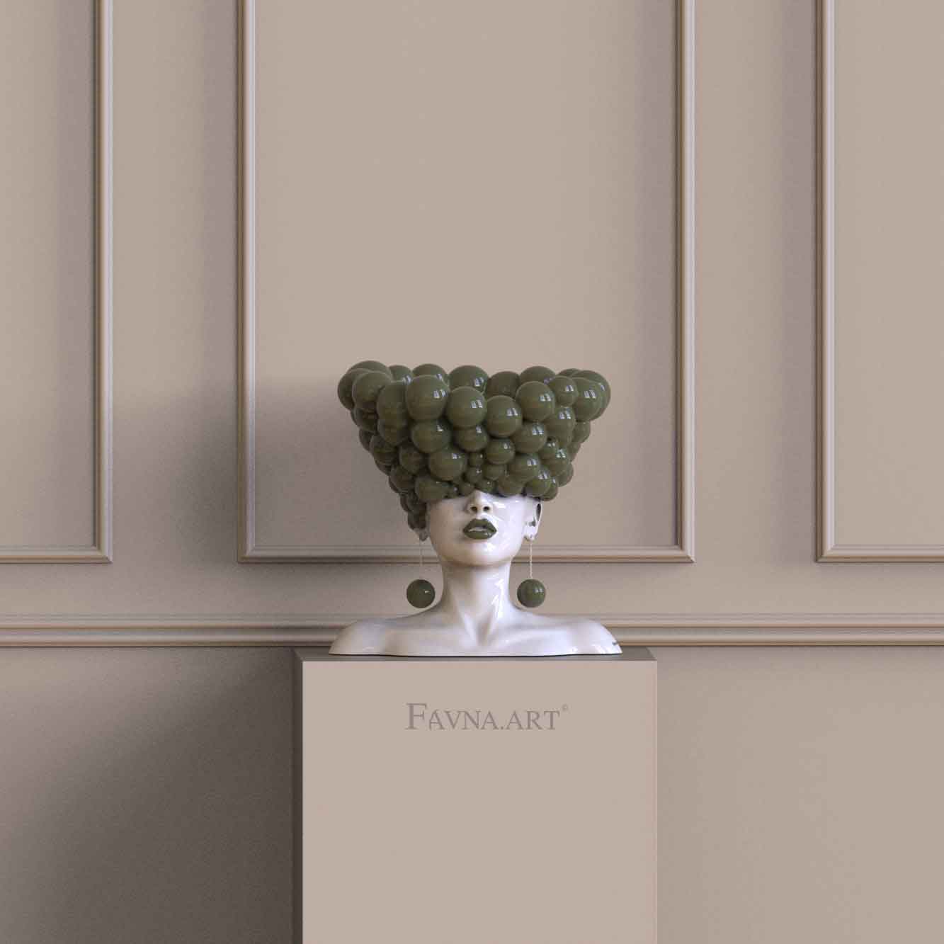 Scultura d’arredo di lusso con busto femminile verde oliva per un interno contemporaneo.