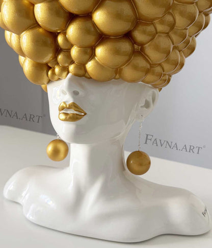 Sculpture of a woman "Thoughts" gold