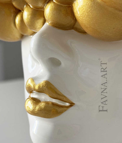 Sculpture of a woman "Thoughts" gold