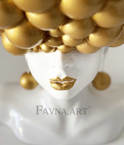 Sculpture of a woman "Thoughts" gold