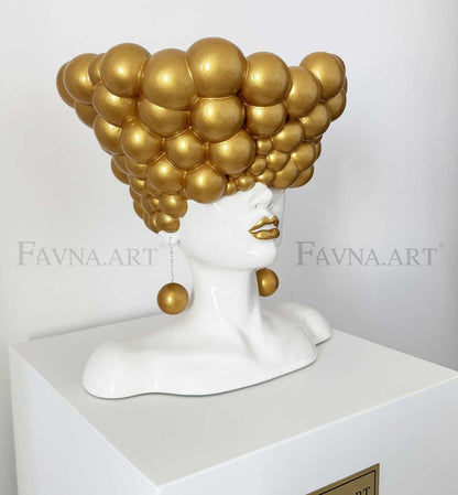 Sculpture of a woman "Thoughts" gold