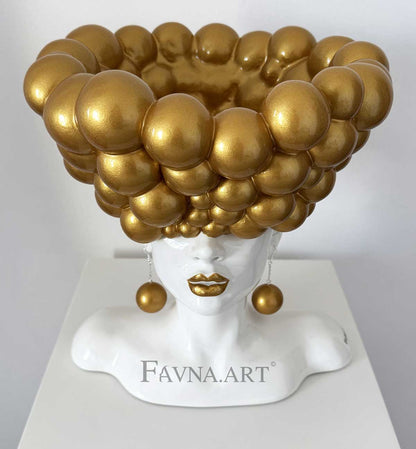 Sculpture of a woman "Thoughts" gold