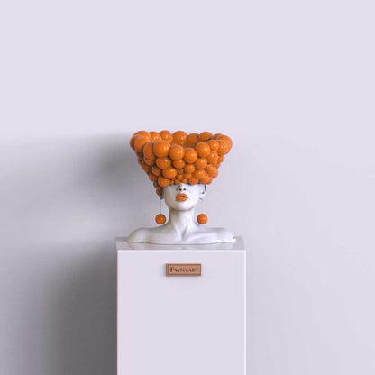 Sculpture of a woman "Thoughts" in an orange color