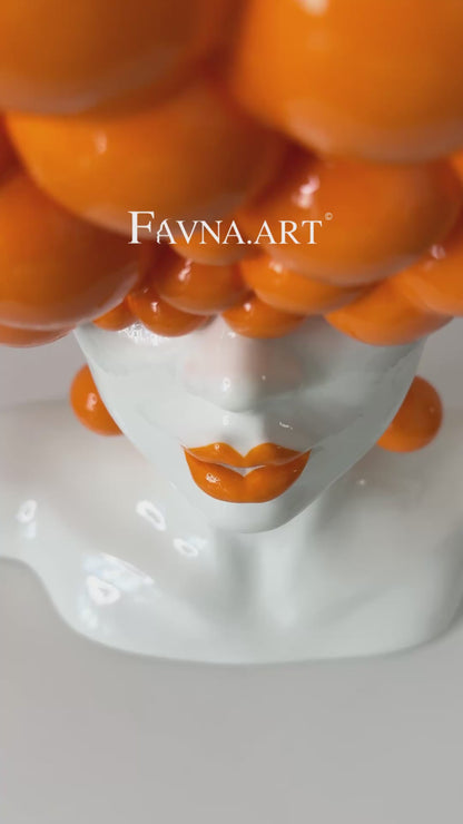 Скульптура жінки "Думки" оранжевого кольору 