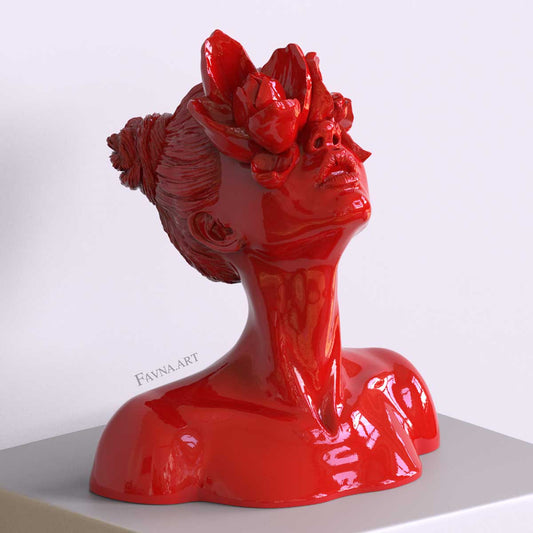 Scultura moderna di design per interni contemporanei, statua femminile a busto con fiori negli occhi. Scultura artistica moderna di colore rosso.