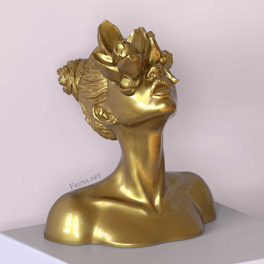 Scultura moderna di design per interni contemporanei, statua femminile a busto con fiori negli occhi. Scultura artistica moderna di colore oro.